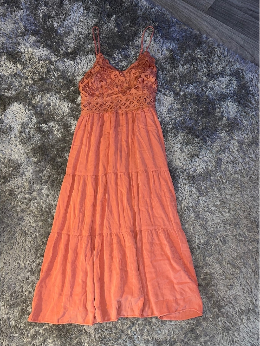 rust/coral-orange maxi dress with a pretty bohemian, feminine style.